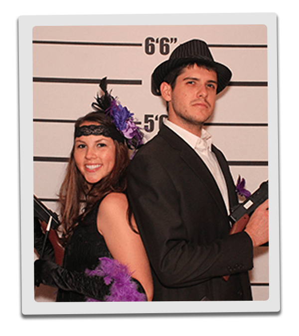 San Jose Murder Mystery party guests pose for mugshots