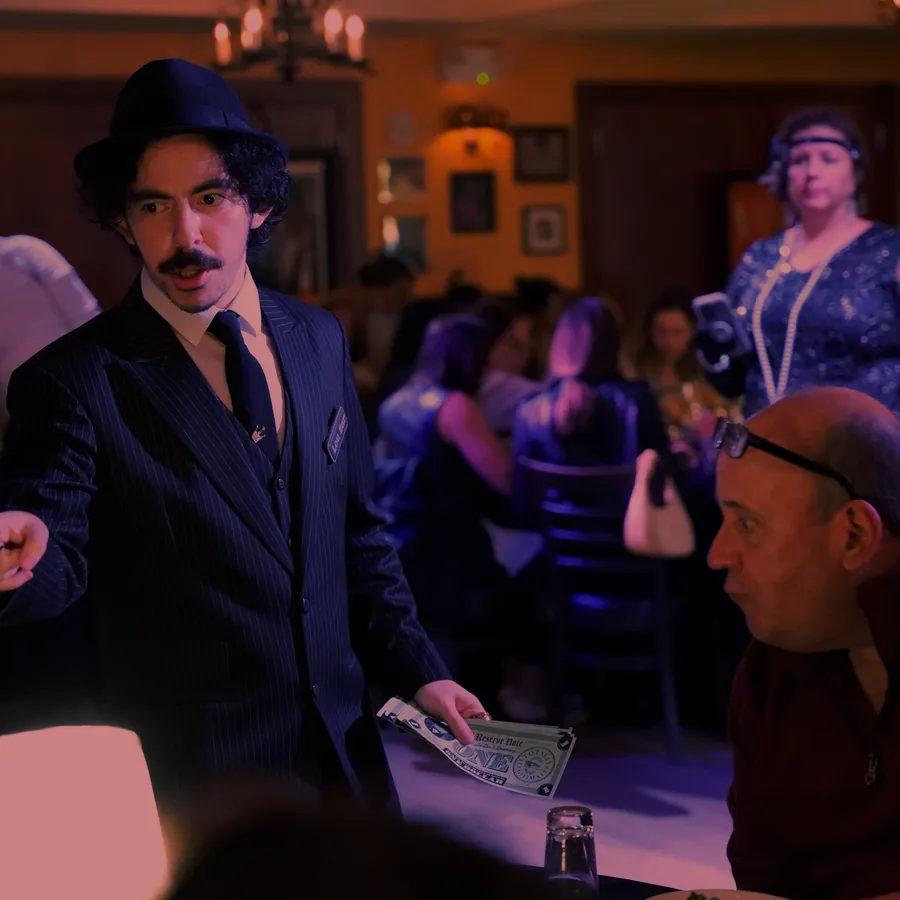 A Murder Mystery Company actor working the room at a San Jose show